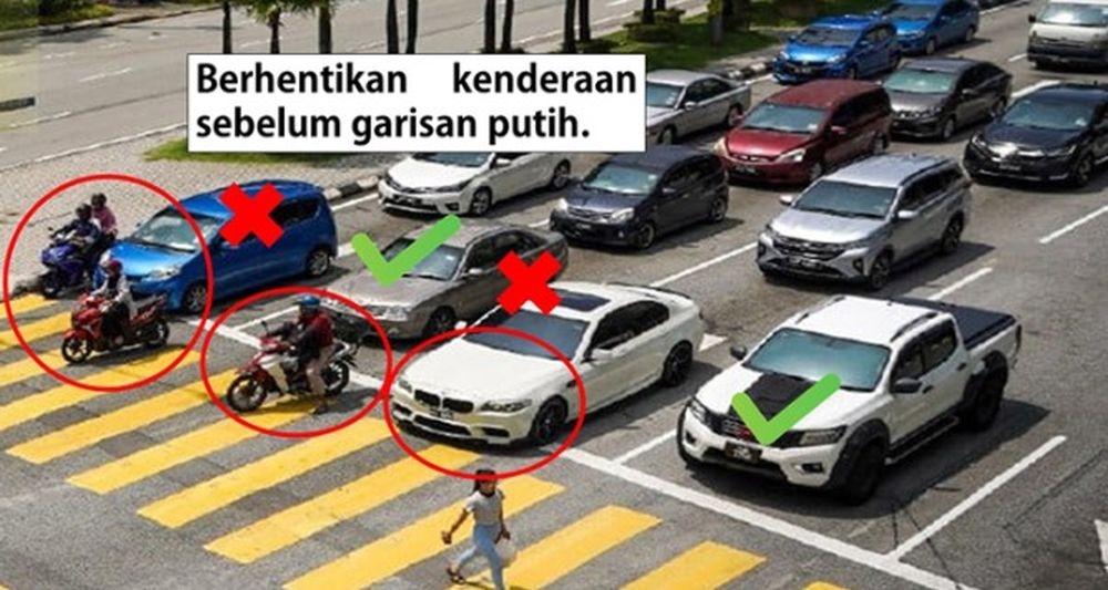 Người đi xe máy dừng đèn đỏ quá vạch có thể bị đi tù ở Malaysia